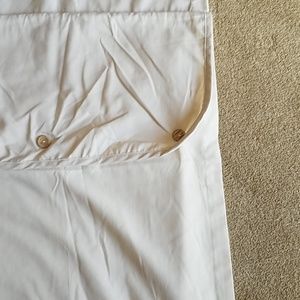 Cream curtains with large area for rod